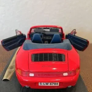 voiture miniature PORSCHE 911 CARRERA CABRIOLET 1994 1/18 MAISTO